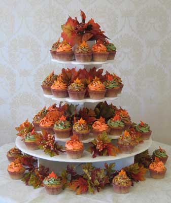 Wedding Cupcake Tree iced in Fall colors topped with Fall Leaves Sugar 